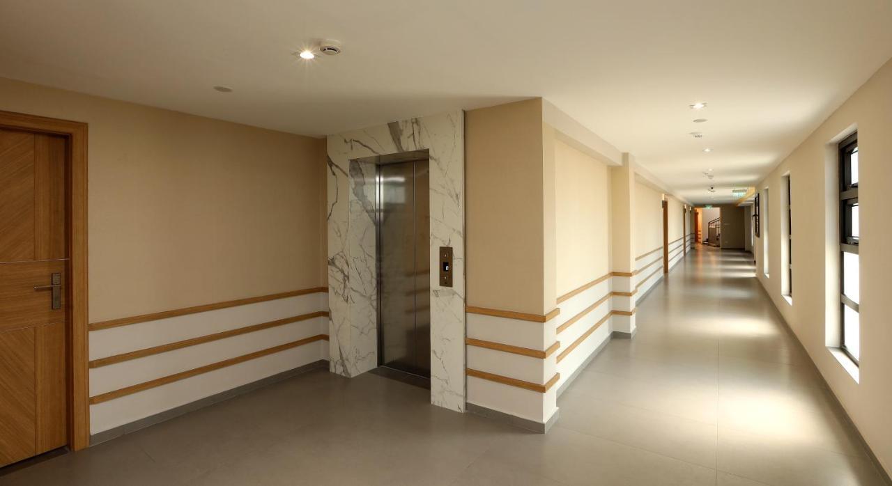 Отель Flora Charishma Residency Aluva Коччи Экстерьер фото